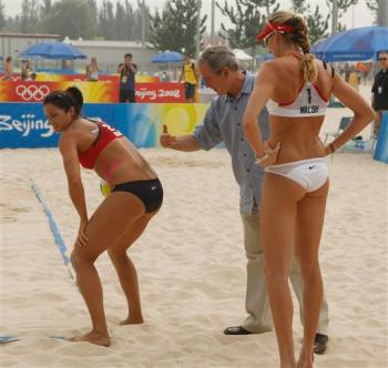 George W. Bush smacking the ass of a female Olympic volleyball player